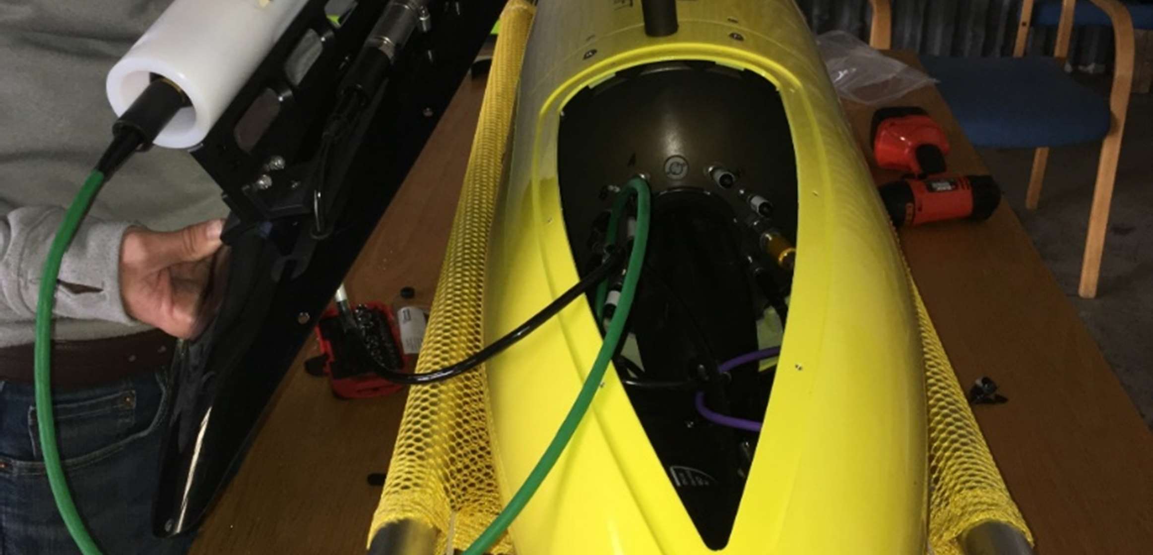 Connecting a sensor cable inside the aft fairing